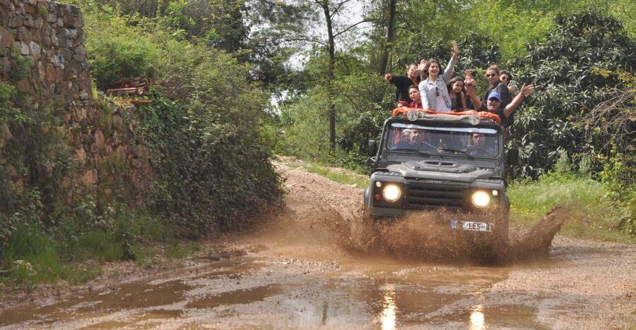 Alanya: Jeep Tour with Dim Cave, Waterfall with Dimcay Lunch - Cooling off at the Dim River