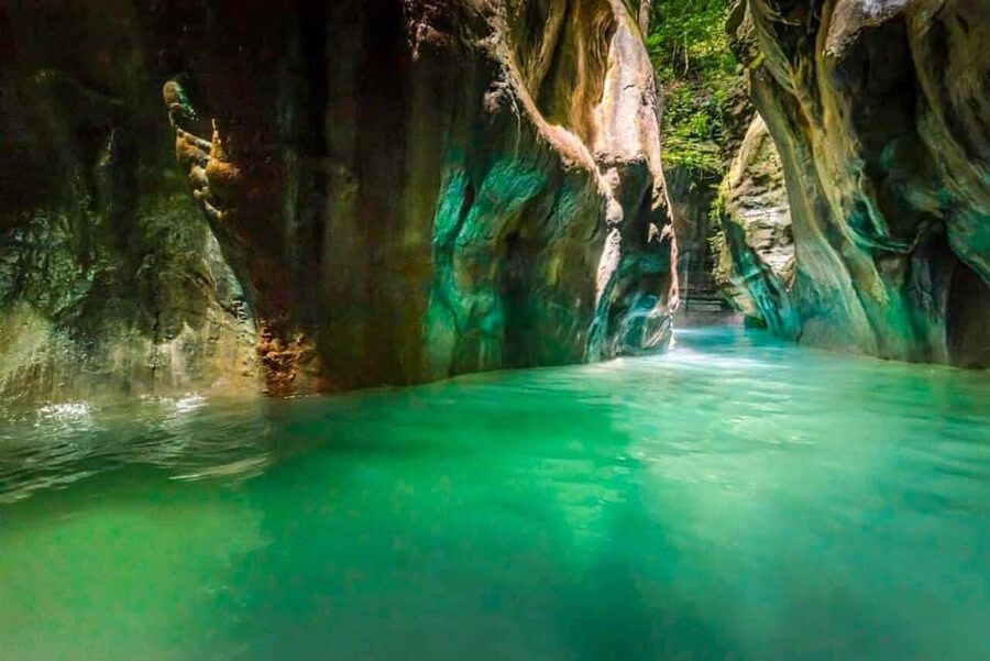 Amber Cove/Taino Bay: 7 Waterfall Tour with Swimming & Lunch - Sliding and jumping through the canyon