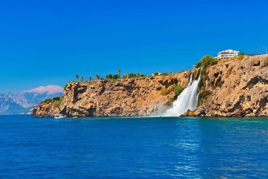 Antalya Boat Tour: Düden Waterfall, Swim & Soft Drinks - Guides, languages, and the level of commentary