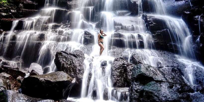 Bali: 3 Waterfalls and Tegalalang Rice Terrace Private Tour - Kanto Lampo, the rocky cascade near Ubud