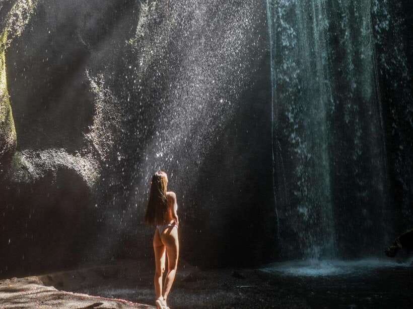Bali: Blue Lagoon Snorkeling & Waterfall Tour - Tukad Cepung Waterfall trades reef views for canyon light