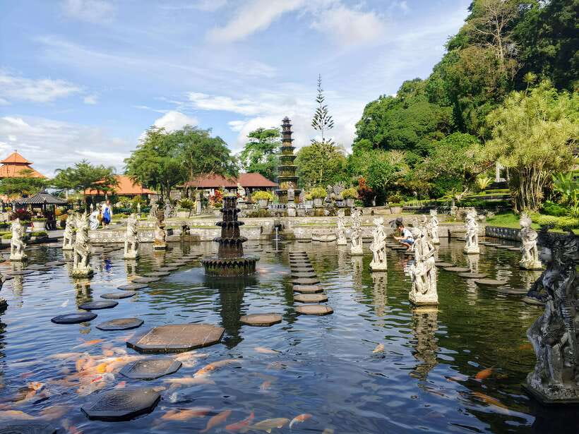 Bali: Lempuyang Temple, Tirta Gangga, and Temesi Waterfall … - Tirta Gangga’s pools, fish, and gardens