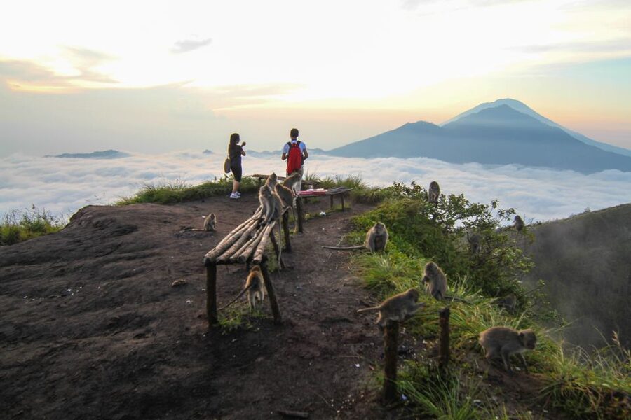 Bali: Mount Batur Sunrise Hike and Hidden Waterfall - Walking the crater rim and crossing lava