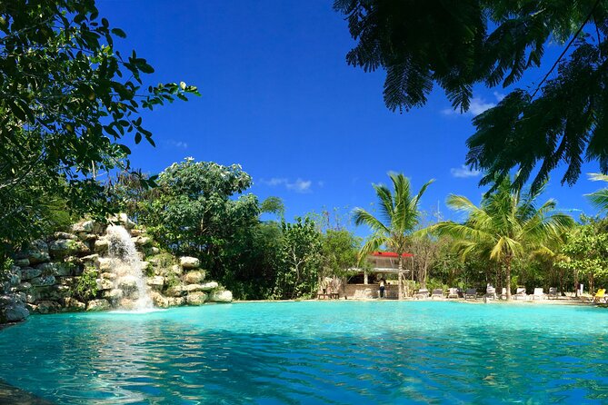 Bavaro Adventure Park Buggy Ride, Zipline Mega Splash, and Waterfall Pool - The Dominican Village and local tastings