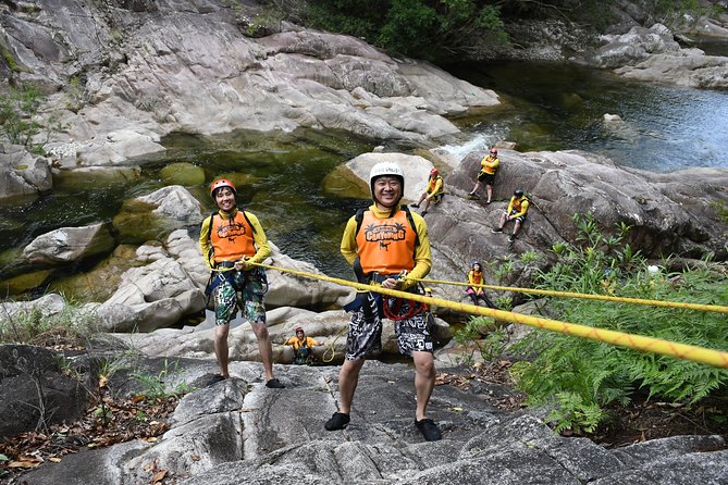 Behana Canyoning Tour by Cairns Waterfalls - Swimming, sliding, and jumping through Behana Gorge