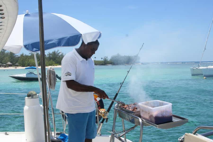 Catamaran Trip to Ile au Cerfs with Lunch and GRSE waterfall - Sailing back with music and Mauritian character
