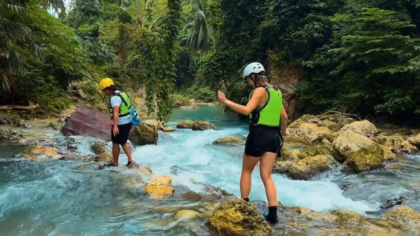 Cebu: Kawasan Falls Canyoneering Tour with Ziplining & Lunch - Kawasan Falls by swimming, sliding, and jumping