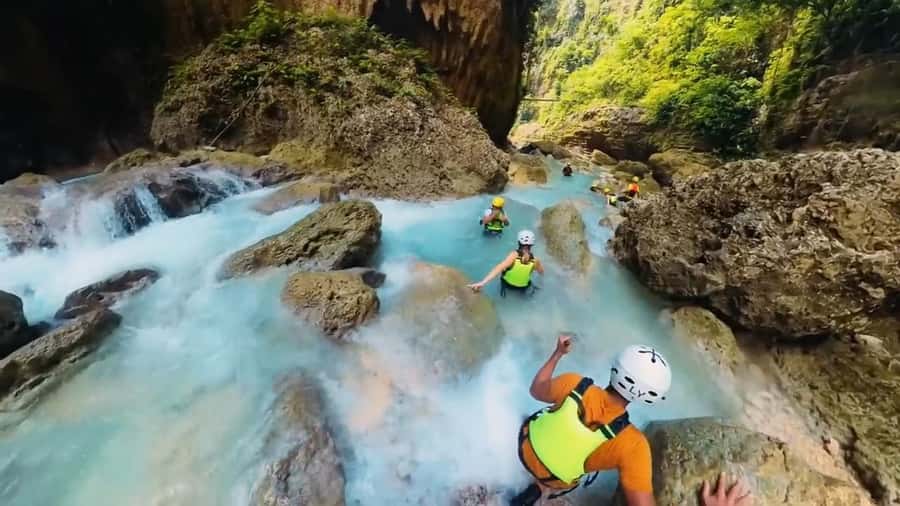 Cebu: Osmeña Peak and Kawasan Canyoneering Day Tour - The final swim at Kawasan Falls