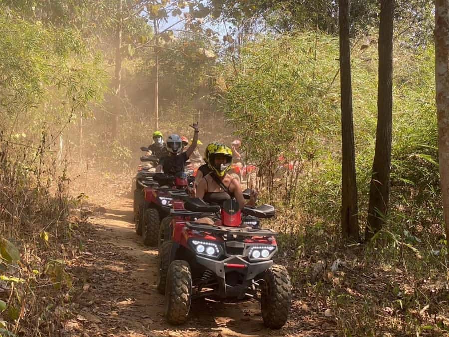 Chiang Mai: ATV, White Water Raft, & Sticky Waterfall Tour - Thai lunch and a quick change of pace