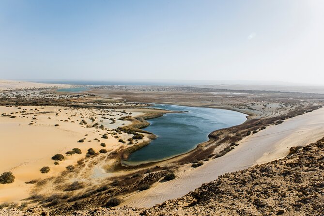From Cairo: Desert Safari, Waterfalls, Sand boarding and Camel ride with Lunch - Barbecue at the Bedouin camp