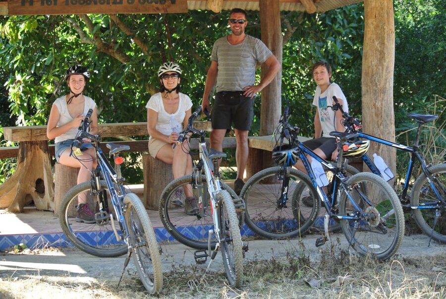 From Chiang Mai: Mae Taeng Valley and Waterfalls Cycle Tour - Riding through farms, villages, and forest paths