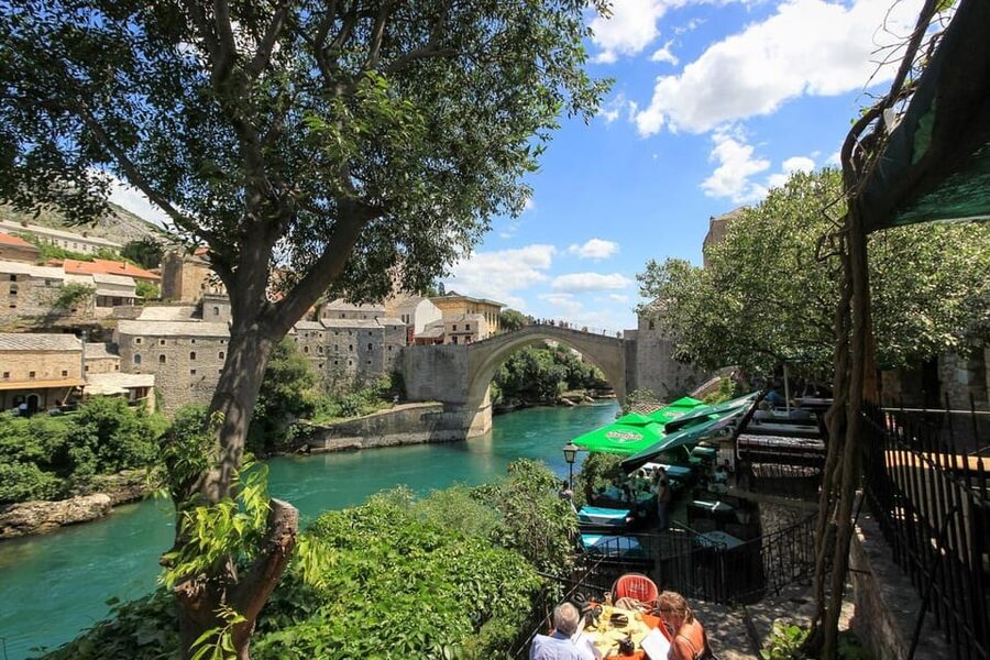 From Makarska : Mostar and Kravica Waterfalls Day Trip - Entering Mostar through Stari most