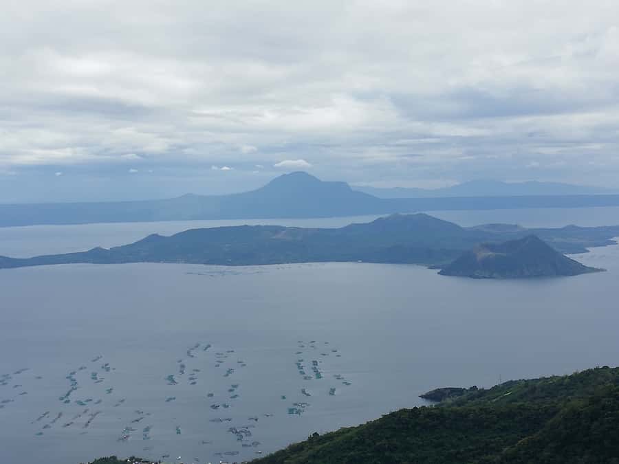 From Manila: Taal Volcano Island & Pagsanjan Falls Day Tour - Riding the Pagsanjan rapids with two local boatmen