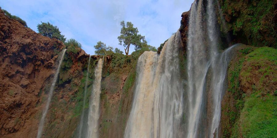 From Marrakech: Ouzoud Waterfalls Guided Hike and Boat Trip - Monkeys, vendors, and respectful visiting