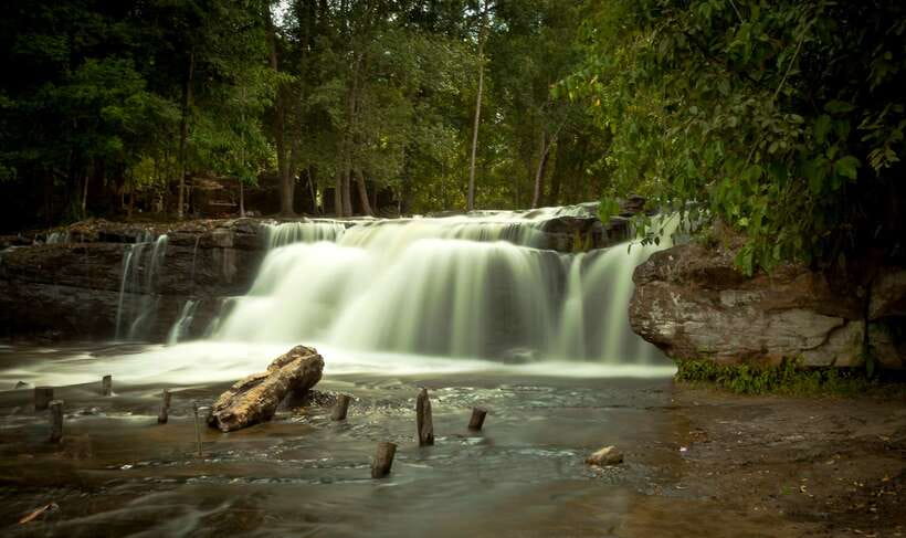 From Siem Reap: Small-Group Phnom Kulen Waterfall Day Tour - The Grand Reclining Buddha carved from the mountain