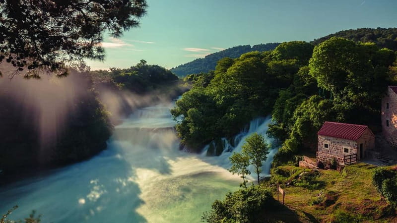 From Split: Krka Waterfalls with Riverboat Ride & swimm stop - Watermills and the Ethnographic Village