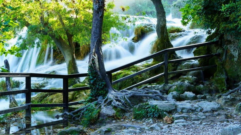 From Split: Krka Waterfalls with Riverboat Ride & swimm stop - Two Hours in Skradin