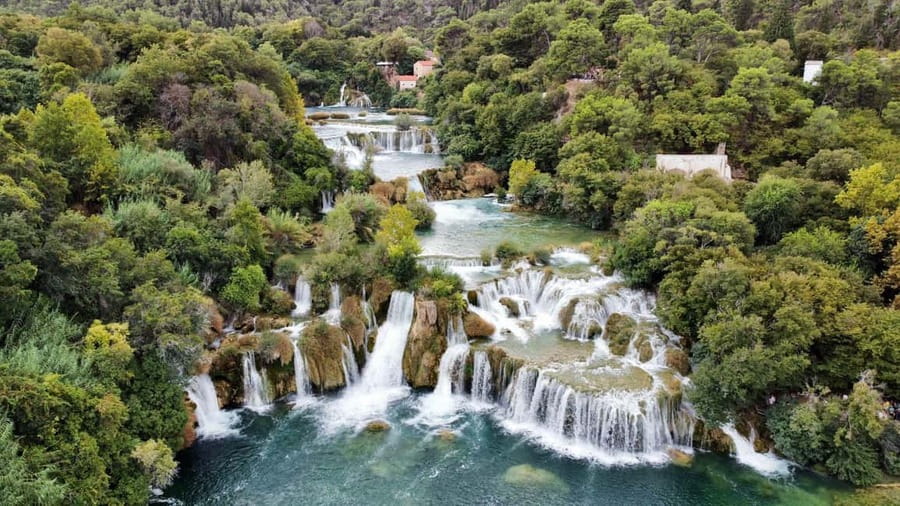 From Split: Krka Waterfalls with Wine & Cheese Tasting Tour - Swimming at the river’s meeting point with the sea