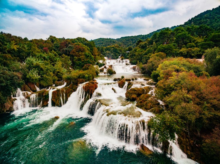 From Split & Trogir: Krka Waterfalls Day Tour with Boat Ride - Walking the old watermills and forest paths