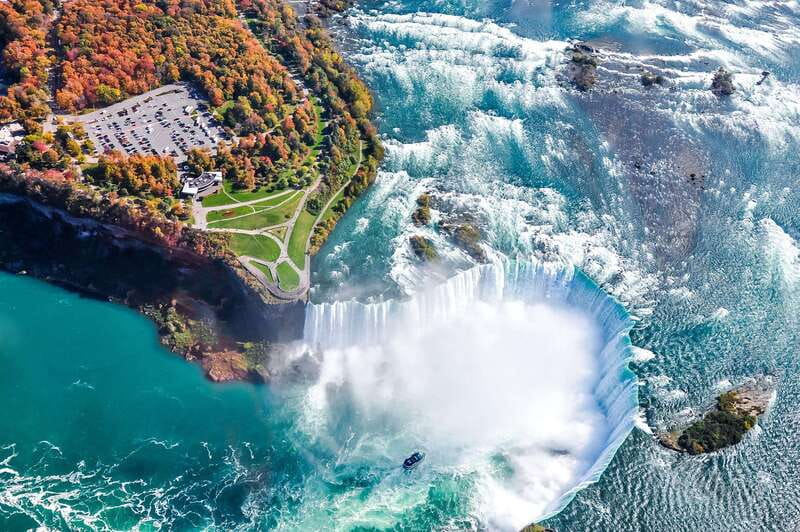 From Toronto: Niagara Falls Bus Tour with Boat Cruise - Three to four hours beside the falls