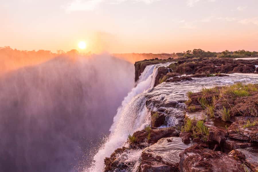 From Victoria Falls: Livingstone Island Tour & Devils Pool - The five-minute boat ride to Livingstone Island