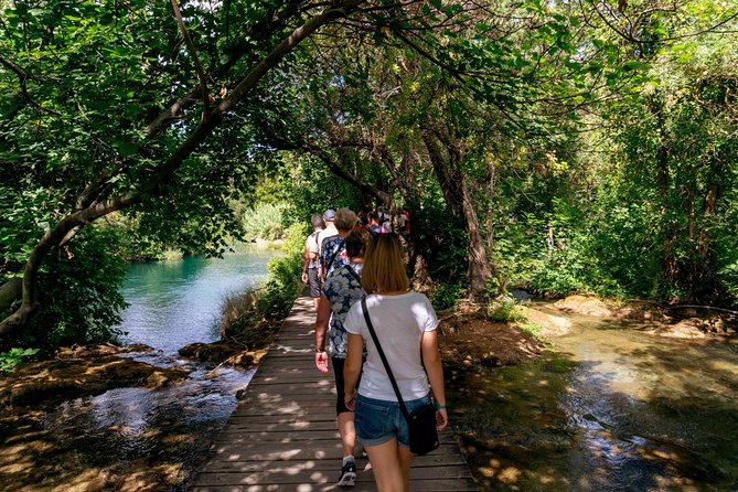 From Zadar: Krka National Park and Waterfalls Day Trip - Šibenik adds stone streets and a UNESCO cathedral
