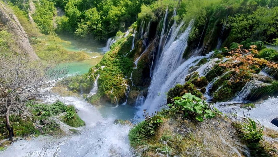 From Zadar: Plitvice Lakes Day Trip with Guide and Boat Tour - Waterfalls, Wooden Paths, and Photo Stops