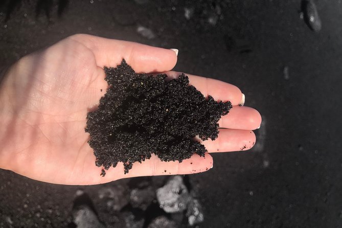 Hilo Shore Excursion: Volcano Safari Lava Caves & Black Sand - Black sand and warm water at Pohoiki