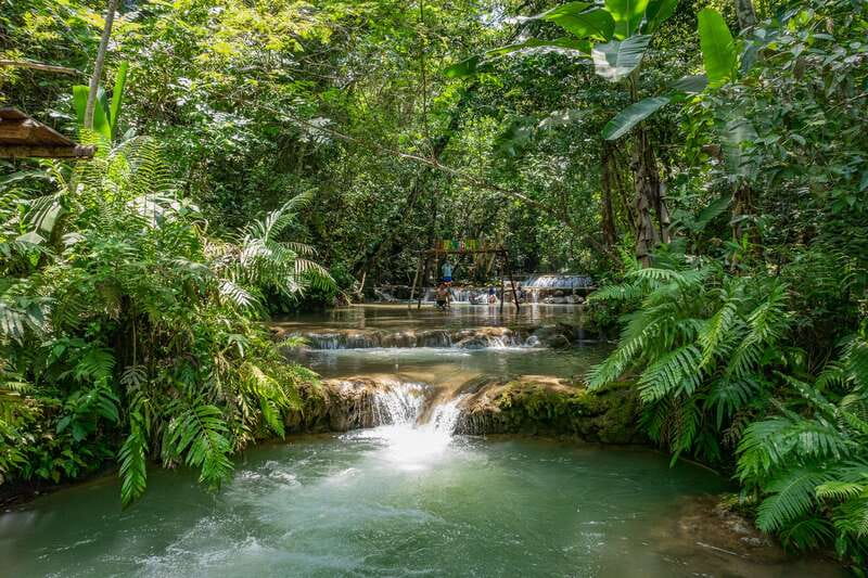 Huatulco: Mountain Waterfall Tour with Local Lunch - Walking beside the river to the falls
