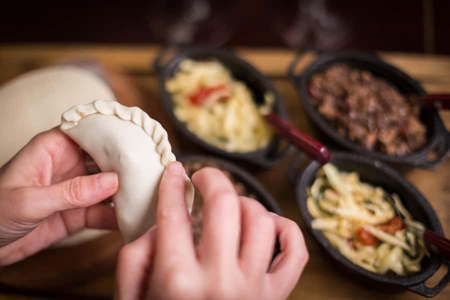 Iguazu Falls: The Argentine Experience Interactive Dinner - Learning the art of the empanada fold