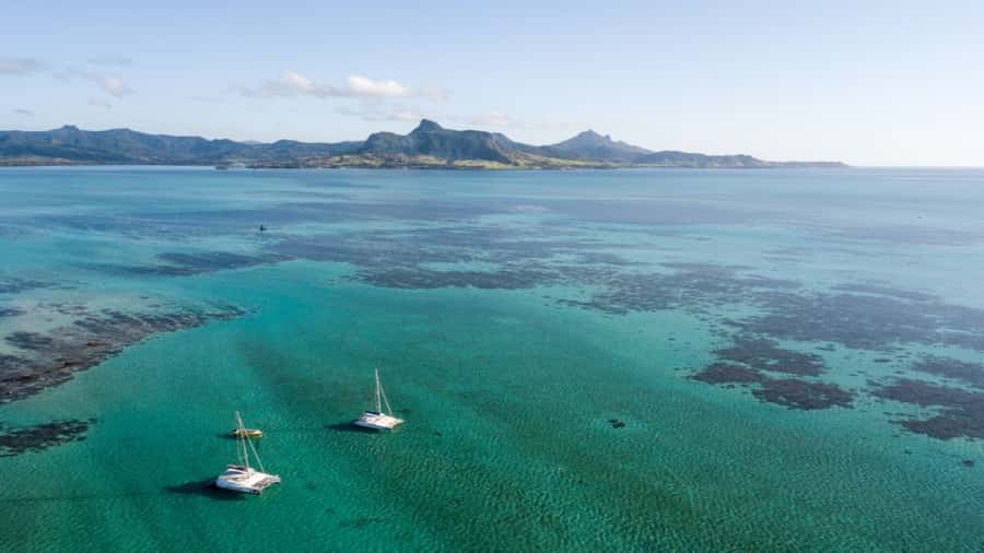 Ile Aux Cerfs Catamaran Cruise & Waterfalls- Lunch & Drinks - BBQ lunch, saffron rice, and drinks on board