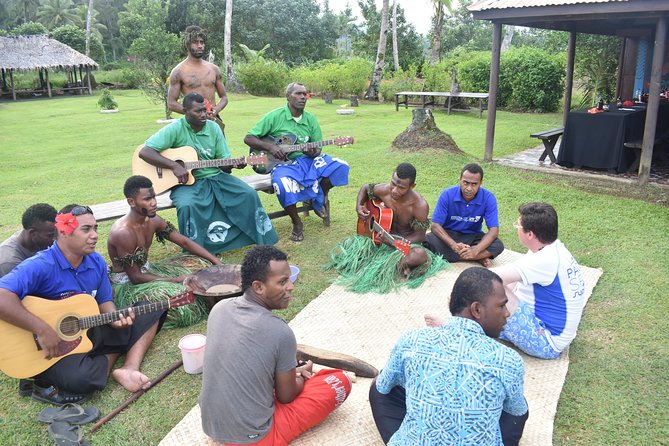 Jewel Of Fiji incl Fijian Village, waterfall & Lunch(Nadi Hotels) - Entering the village and meeting local hosts