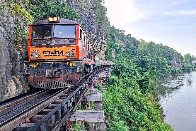 Kanchanaburi Day Trip: WWII Death Railway & Erawan Falls - Starting at Don Rak War Cemetery and the railway museum