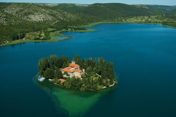 Krka Waterfalls and Sibenik Day Trip from Zadar - Three hours on paths, bridges, and rushing water