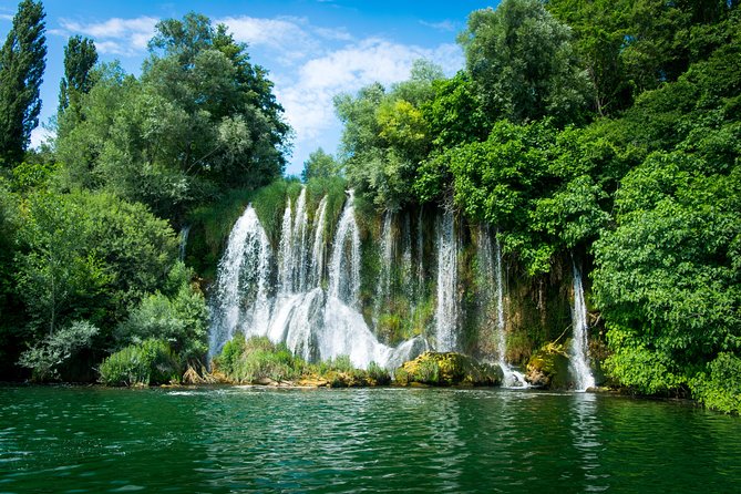 Krka Waterfalls, Food & Wine Tasting, Boat Ride & Zadar Old Town - Walking through Krka’s waterfalls