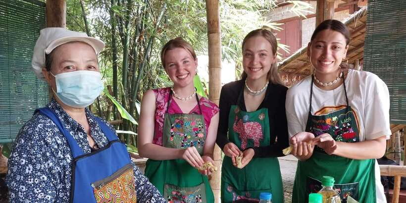 Luang Prabang: Bamboo Experience & Kuang Si Falls Tour - Cooking bamboo shoots for lunch