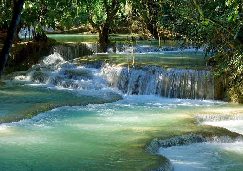 Luang Prabang: Pak Ou Caves & Kuang Si Falls Day Trip - A Mekong-side lunch and the road to Kuang Si