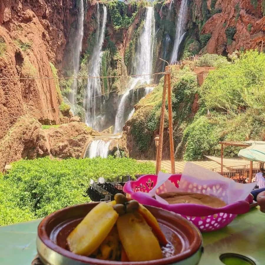 Marrakech: Ouzoud Waterfall, Guided Hike, Boat Ride & Lunch - The boat ride at the base of Ouzoud Falls