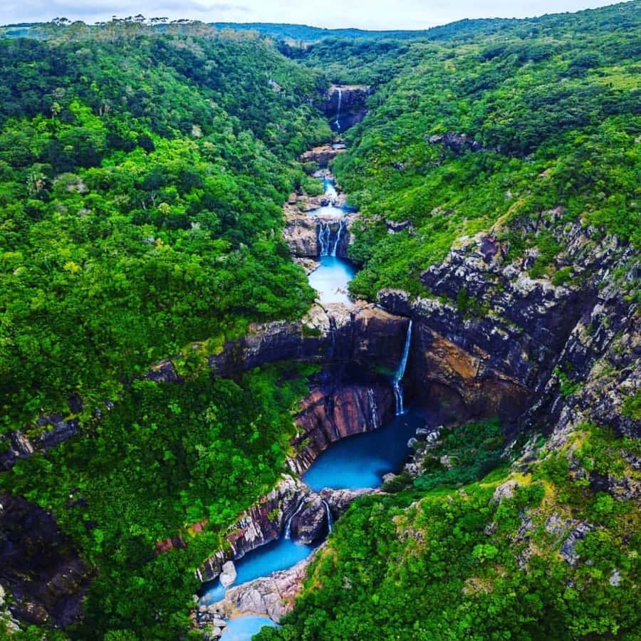 Mauritius: 7 Waterfalls Hike with Lunch and Hotel Transfers - The first steps are easy, then the ground changes