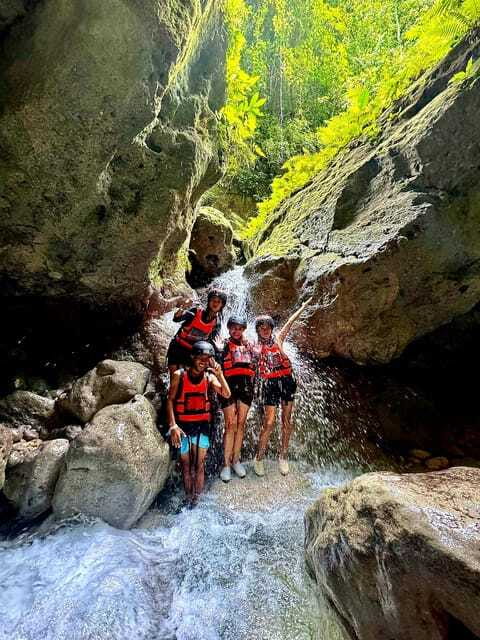 Moalboal: Kawasan Canyoneering with Lunch & Free Transfers - Walking, swimming, sliding, and jumping