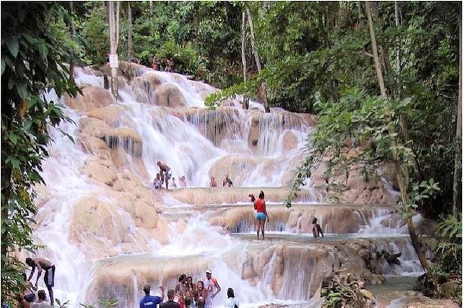 Montego Bay to Dunn's River Falls Half-Day Trip - Swimming at the base of the falls