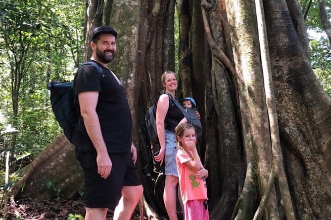 Munduk Twin Lake Jungle Hike, Ulun Danu Temple, & Waterfall - Crossing Tamblingan Lake by canoe