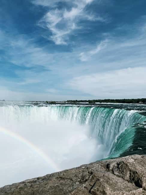 Niagara Falls: Day Tour with Boat & Journey Behind the Falls - Pickup and the Canadian-side boundary