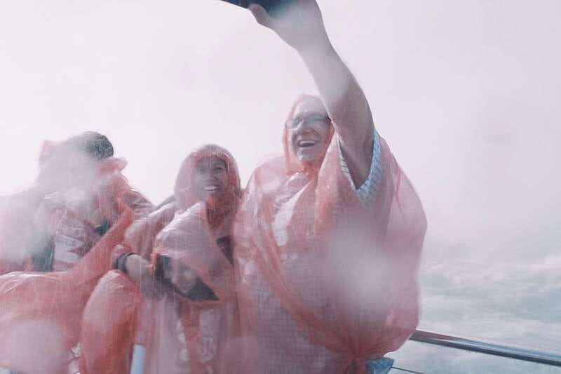 Niagara Falls, ON: Helicopter Ride with Boat & Skylon Lunch - Journey Behind the Falls and the sound of the water