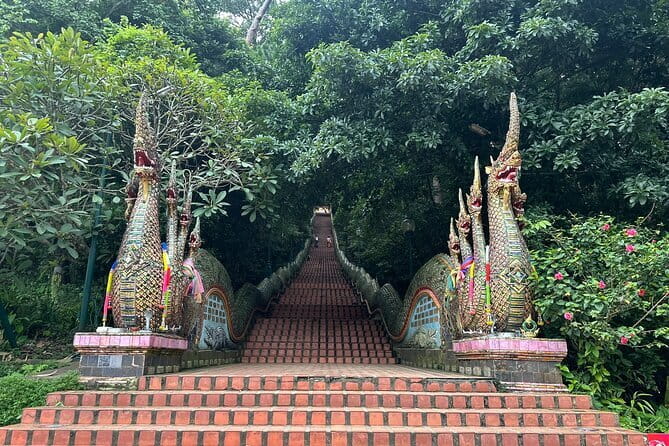 Private Doi Suthep Temple Handicraft Center and Sticky Waterfall - Starting beneath Doi Suthep at Khruba Siwichai Monument
