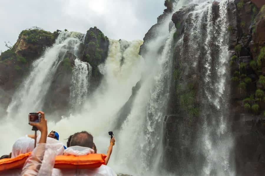 Puerto Iguazu: Iguazu Falls Boat Tour and Gran Aventura - Price, included items, and extra costs
