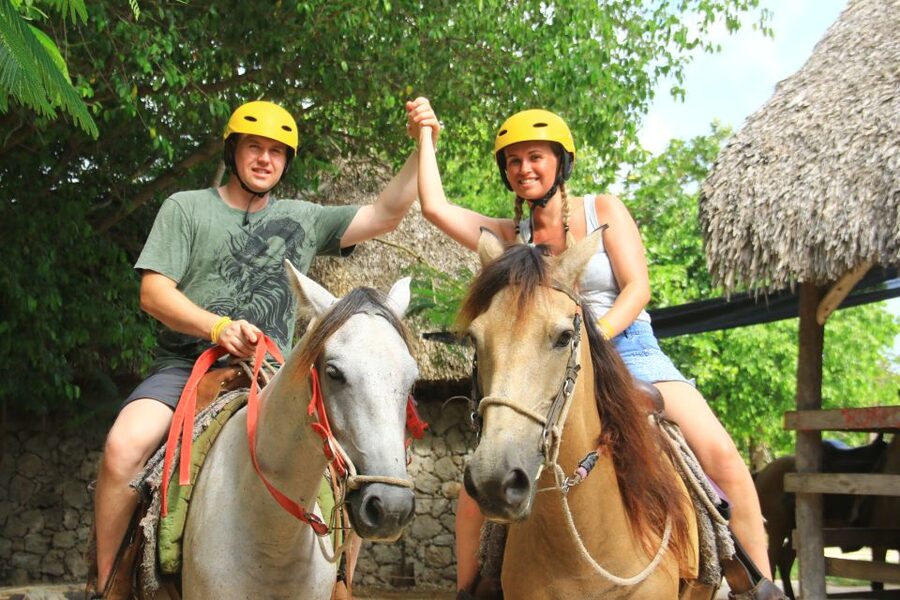 Punta Cana: Bávaro Adventure Park Horse Riding & Waterfalls - Cooling off at the Waterfall Pool