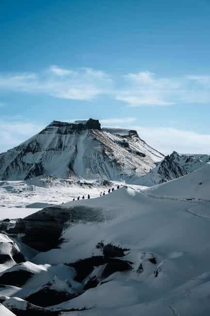 Reykjavik: Katla Ice Cave & South Coast Waterfalls Tour - Vík is the changeover point