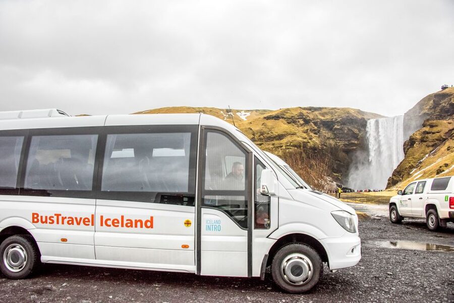 Reykjavik: South Coast Waterfalls & Glacier Small-Group Tour - Vík and lunch beneath the cliffs