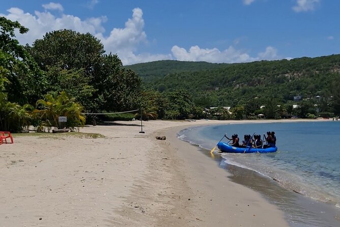 River Rapids Waterfalls Rafting and Beach Adventure - Bamboo shade, a rope swing, and optional waterfall swimming